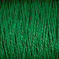 Close-up image of multiple green threads from Supreme Corp's 5/2 Pearl Cotton Yarn running vertically. The tightly packed threads create a textured pattern, with the vibrant green hue subtly reflecting light. This emphasizes the individual fibers' strands and showcases the versatility of this premium yarn available in large cones.