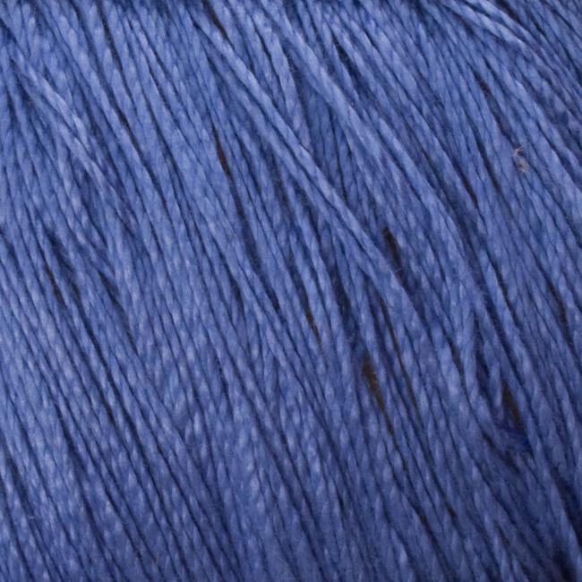 Close-up image of a bundle of 5/2 Pearl Cotton Yarn from Supreme Corp. The strands are tightly packed together, showcasing the smooth texture and even coloration of the versatile yarn fibers on this large cone.