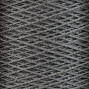 Close-up image of a large cone of Supreme Corp's 5/2 Pearl Cotton Yarn, tightly wound in a crisscross pattern. The textured gray fibers have a slightly glossy finish, reminiscent of mercerized cotton yarn. The yarn appears sturdy and versatile, likely used for knitting or weaving.