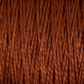 Close-up of Supreme Corp.'s 10/2 Pearl Cotton Yarn in large cone. The fibers are tightly twisted together, showcasing a detailed texture where individual strands interweave to create a thick, cohesive material. The earthy brown hue enhances the versatile yarn with a rich, warm appearance.