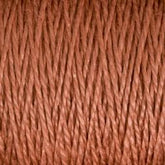 Close-up image of brown 10/2 Pearl Cotton Yarn from Supreme Corp. The tightly twisted fibers are meticulously arranged vertically, creating a consistent and uniform appearance.