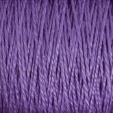 Close-up image of Supreme Corp.'s 10/2 Pearl Cotton Yarn neatly wound into a ball. The yarn has a soft, textured appearance with a slight sheen, showcasing the intertwining fibers and consistent thickness. The rich and vibrant hue highlights its versatility and colorfast quality.