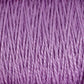 Close-up image of tightly wound lavender-colored 10/2 Pearl Cotton Yarn by Supreme Corp. The texture of the yarn is detailed, showcasing the individual fibers twisted together to form a cohesive strand. The image highlights the intricate pattern and soft sheen of this versatile, colorfast yarn on a Large Cone.