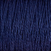 Close-up of dark blue 10/2 Pearl Cotton Yarn by Supreme Corp., with strands tightly wound together, creating a rich, textured pattern. This versatile yarn, available in a large cone, is uniformly colored with a slightly glossy finish, showcasing its colorfastness and highlighting the intricate weave of the individual fibers.