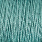 Close-up image of soft, aqua-colored 10/2 Pearl Cotton Yarn strands from Supreme Corp., lined up vertically to showcase the texture and woven fibers in detail. The light catches the versatile yarn's surface, giving it a slightly glossy appearance and highlighting its colorfast quality.