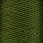 Close-up image of a spool of Supreme Corp.'s 10/2 Pearl Cotton Yarn in green, showcasing tightly wound threads that form a crisscross pattern. The colorfast yarn exhibits uniform coloring, with neatly aligned strands.