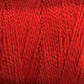 Close-up image of a skein of Supreme Corp.'s 10/2 Pearl Cotton Yarn | Large Cone in red, showcasing the tightly wound fibers and texture. The yarn appears smooth, slightly shiny, and colorfast, making it suitable for versatile knitting or crocheting projects.