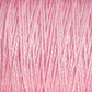 Close-up image of light pink yarn, showing detailed textures and fibers intertwined in a uniform pattern. The versatile 10/2 Pearl Cotton Yarn from Supreme Corp. appears soft and smooth, with subtle variations in color and light enhancing its texture and depth.