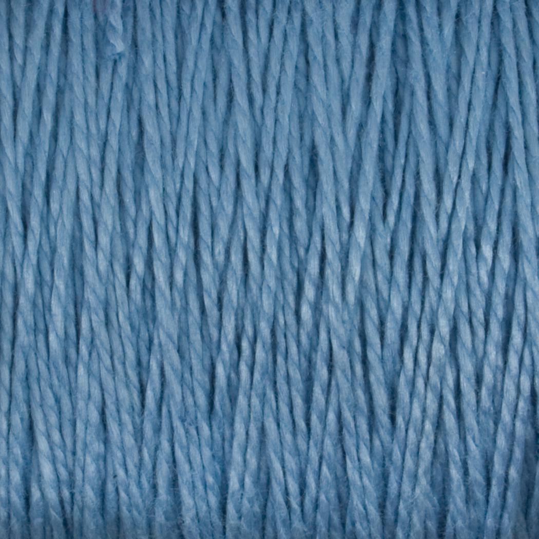 Close-up of the light blue 10/2 Pearl Cotton Yarn from Supreme Corp., tightly wound together. The strands, reminiscent of fine quality Pearl Cotton, are evenly aligned, displaying a soft, textured surface with a slight sheen. The yarn appears to be made of a smooth, possibly synthetic, colorfast material.