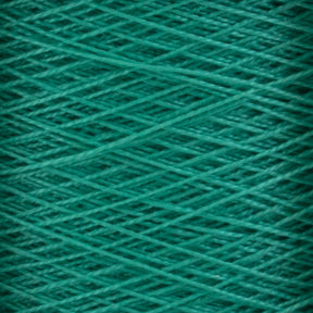 Close-up image of Supreme Corp.’s 10/2 Pearl Cotton Yarn (Large Cone) in a vibrant teal hue, tightly wound in intricate, intersecting layers to create a textured, crisscross pattern. This versatile yarn is uniformly wound without any loose strands visible, showcasing its colorfast quality.