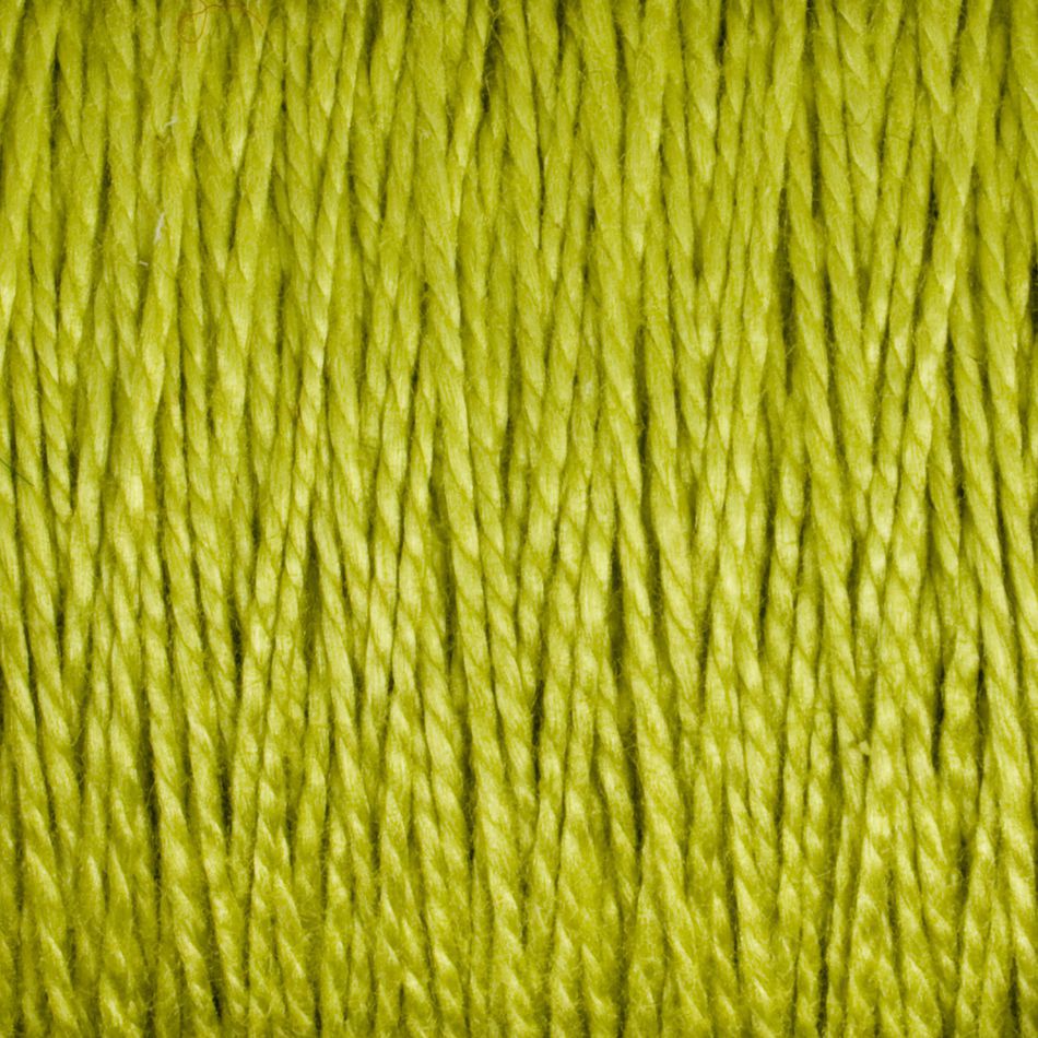 Close-up of multiple strands of bright green twine or rope tightly bundled together, showing the texture of the fibers. The image emphasizes the color and intricate pattern of the intertwined threads, reminiscent of Supreme Corp.'s 10/2 Pearl Cotton Yarn on a Large Cone, renowned for its fine and colorfast qualities.