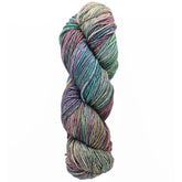 A skein of Malabrigo Rios by Malabrigo Yarn featuring kettle-dyed colors in a vibrant blend of greens, blues, purples, and yellows tightly wound together against a white background.