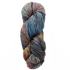 A skein of Malabrigo Rios by Malabrigo Yarn, showcasing kettle-dyed shades of blue, green, yellow, and red, is tightly coiled against a white background.