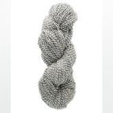 A twisted skein of Tuffy Canadian Sock Yarn in gray and white marled colors from the Briggs & Little brand is displayed against a plain white background.