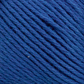 Close-up image of tightly wound, textured strands of Cotton Fleece in dark blue, by Brown Sheep. The yarn appears to be made from natural cotton fiber, with visible individual threads intertwined to create a uniform and cohesive surface ideal for intricate knitting patterns.