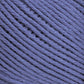 Close-up image of Brown Sheep Cotton Fleece in purple, showing the texture and individual fibers. The strands are arranged neatly in a parallel pattern, highlighting the smooth and slightly fuzzy surface of the yarn. This soft pastel-toned yarn is perfect for delicate knitting patterns.