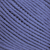 Close-up image of Brown Sheep Cotton Fleece in purple, showing the texture and individual fibers. The strands are arranged neatly in a parallel pattern, highlighting the smooth and slightly fuzzy surface of the yarn. This soft pastel-toned yarn is perfect for delicate knitting patterns.