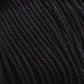 Close-up of Cotton Fine yarn by Brown Sheep. The image reveals tightly twisted black strands with a slightly glossy finish, suggesting it could be synthetic or a blend with natural fibers. The smooth texture makes it ideal for knitting, crocheting, or weaving projects for machine knitters.