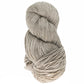 A twisted skein of Cascade Eco and Cascade Eco Plus Wool Yarn from Cascade Yarns on a white background, highlighting its soft texture and natural beige color, ideal for felted knitting projects.