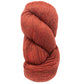 A skein of Cascade Eco and Cascade Eco Plus Wool Yarn by Cascade Yarns, featuring orange and red hues, is crafted from eco-friendly Peruvian Highland wool. Its neatly twisted, soft, and textured fibers make this thick yarn perfect for knitting or crocheting cozy clothing items and ideal for felted knitting projects.