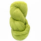 A skein of eco-friendly, light green Cascade Eco Plus Wool Yarn from Cascade Yarns, twisted neatly against a white background.