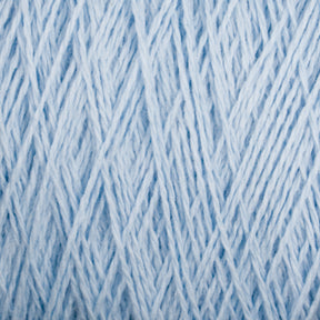 Close-up image of Homestead 8/2 Cotton Yarn from Supreme Corp in light blue, intricately woven together to create a dense, textured pattern. The versatile yarns are twisted and intertwined, forming a complex, uniform design that highlights the subtle variations in color and thickness.