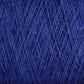 Close-up of deep blue Homestead 8/2 Cotton Yarn | Large Cone by Supreme Corp, highlighting the intricate and tightly interwoven fibers. The texture appears soft and slightly fuzzy, with strands crossing in various directions, creating a rich and detailed pattern. This weaving yarn is machine-washable for easy care.