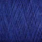 Close-up of deep blue Homestead 8/2 Cotton Yarn | Large Cone by Supreme Corp, highlighting the intricate and tightly interwoven fibers. The texture appears soft and slightly fuzzy, with strands crossing in various directions, creating a rich and detailed pattern. This weaving yarn is machine-washable for easy care.