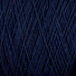 Close-up image of dark blue Homestead 8/2 Cotton Yarn by Supreme Corp, machine-washable and wrapped tightly in a mini-cone, showcasing its intricate and textured pattern.