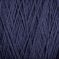 Close-up image of the dark blue Homestead 8/2 Cotton Yarn by Supreme Corp, showing multiple strands crossed and intertwined. The texture appears soft with visible fibrous details, indicating the material is likely suitable for knitting or crocheting. This machine-washable yarn promises convenience and durability for your projects.