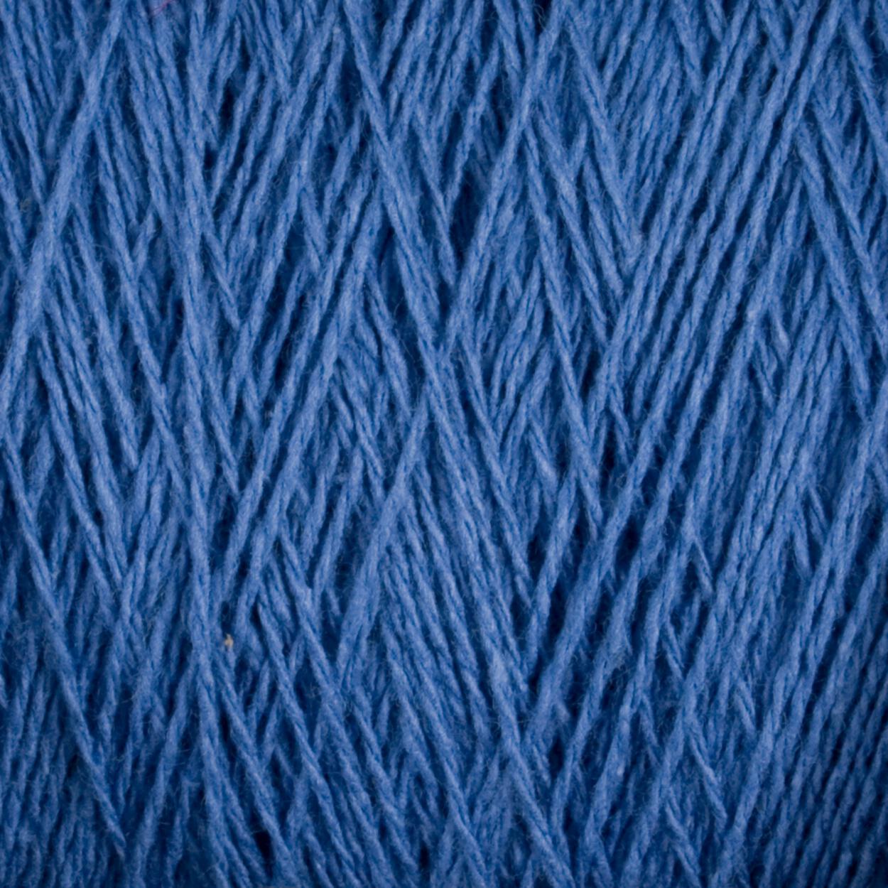 Close-up image of Supreme Corp's Homestead 8/2 Cotton Yarn in blue fibers arranged in an intricate, interwoven pattern. The texture is detailed, highlighting the strands and their varying thicknesses, creating a rich and tactile visual. This machine-washable weaving yarn offers both beauty and practicality.