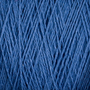 Close-up image of Supreme Corp's Homestead 8/2 Cotton Yarn in blue fibers arranged in an intricate, interwoven pattern. The texture is detailed, highlighting the strands and their varying thicknesses, creating a rich and tactile visual. This machine-washable weaving yarn offers both beauty and practicality.