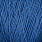 Close-up of multiple strands of blue Homestead 8/2 Cotton Yarn by Supreme Corp, machine-washable and intertwining in varying directions, creating a textured pattern. The yarn appears both thick and tightly wound, showcasing its fibrous consistency and intricate design.