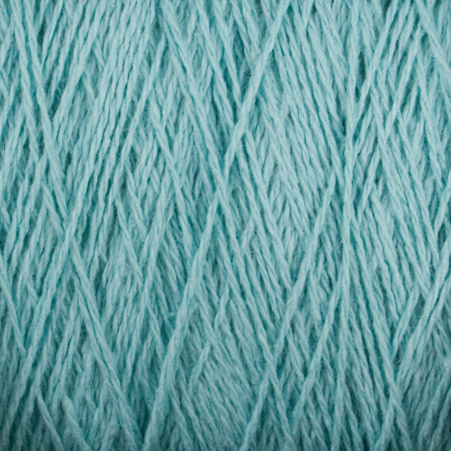 Close-up image of a light blue-colored cone of Homestead 8/2 Cotton Yarn by Supreme Corp, revealing the intricate, intertwined strands that create a textured pattern. The yarn appears soft and slightly fluffy, designed for knitting, crocheting, or other fiber crafts. This machine-washable yarn is perfect for all your creative projects.