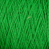 Close-up image of tightly wound, vibrant green Homestead 8/2 Cotton Yarn by Supreme Corp. The texture reveals individual strands intricately interlaced, forming a rich and detailed pattern. Some minor variations in shading and thickness of the threads are visible, adding to the visual depth.