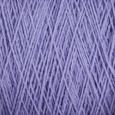 Close-up image of Homestead 8/2 Cotton Yarn | Mini-cone by Supreme Corp in light purple, machine-washable and wound tightly in a crisscross pattern. The texture of the yarn strands and the soft hue are prominent. The image showcases the fine details and fibers of this versatile yarn, making its tactile qualities easily noticeable.