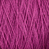 Close-up image of a bundle of magenta-colored Homestead 8/2 Cotton Yarn | Large Cone by Supreme Corp, tightly wound together. The threads appear to be thin and slightly textured, forming a dense and intricate pattern ideal for weaving yarn projects.