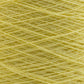 A close-up image showcases the yellow Homestead 8/2 Cotton Yarn from Supreme Corp, wound intricately into a ball. This fine, soft yarn is layered to create a dense and uniform pattern of overlapping strands, making it ideal for weaving projects. Additionally, it's machine-washable for easy care.