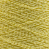 A close-up image showcases the yellow Homestead 8/2 Cotton Yarn from Supreme Corp, wound intricately into a ball. This fine, soft yarn is layered to create a dense and uniform pattern of overlapping strands, making it ideal for weaving projects. Additionally, it's machine-washable for easy care.