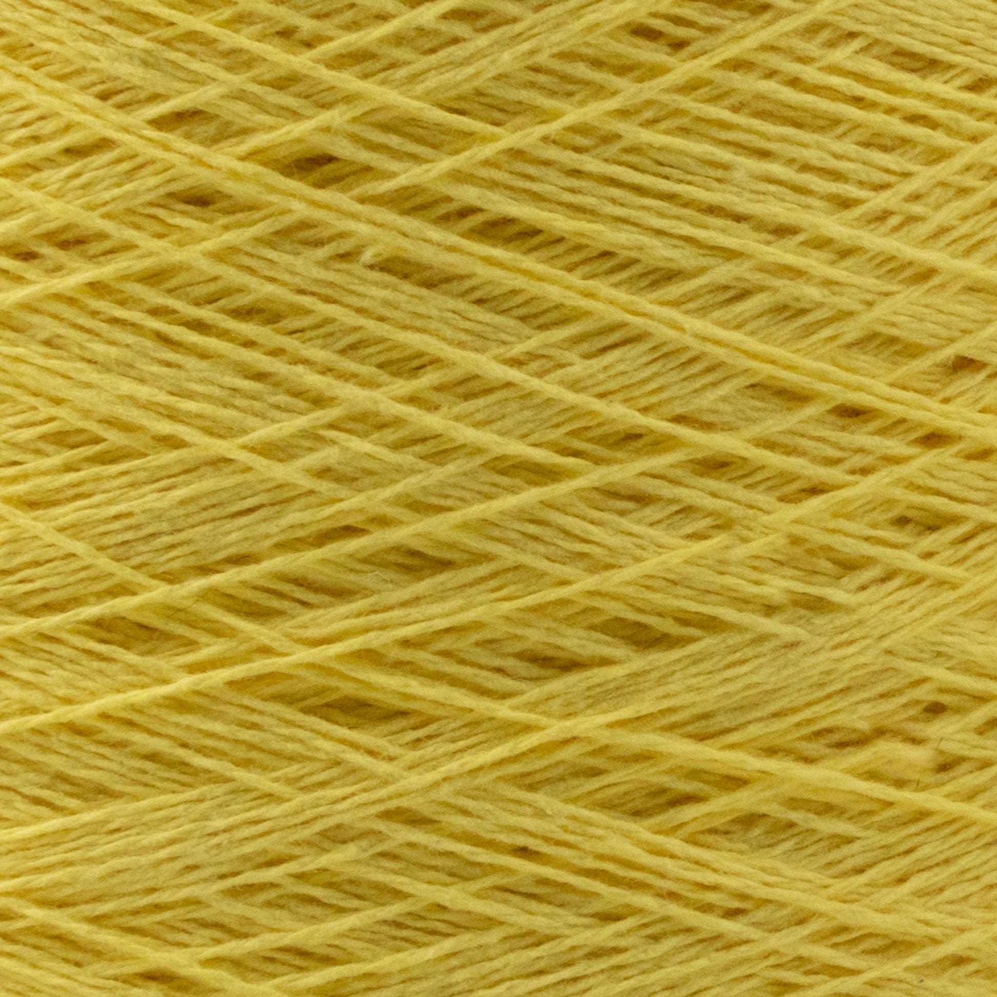 Close-up of a skein of vibrant yellow Homestead 8/2 Cotton Yarn | Mini-cone from Supreme Corp, featuring an intricate pattern of overlapping strands that create a textured and layered appearance. This versatile yarn is machine-washable and has a soft, fibrous texture with slight variations in thickness.