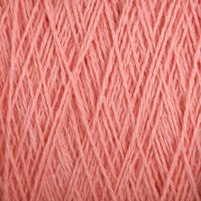 Close-up of Supreme Corp's Homestead 8/2 Cotton Yarn in pink, revealing strands intertwined to form a dense and textured pattern. The yarn is soft and finely spun, with threads crisscrossing each other to create an intricate and detailed fabric-like surface that is conveniently machine-washable.