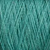 Close-up view of a ball of turquoise Homestead 8/2 Cotton Yarn | Large Cone by Supreme Corp, showcasing the detailed texture and interwoven strands. The fibers are tightly wound, creating a pattern of soft lines and ridges across the surface. This machine-washable yarn is perfect for all your crafting needs.