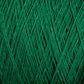 A close-up image of numerous strands of Supreme Corp's Homestead 8/2 Cotton Yarn in green intertwined in a crisscross pattern, creating a textured and dense appearance. The machine-washable yarn appears uniformly colored with a rich, vibrant green hue.