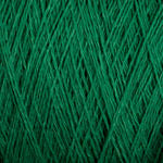 A close-up image of numerous strands of Supreme Corp's Homestead 8/2 Cotton Yarn in green intertwined in a crisscross pattern, creating a textured and dense appearance. The machine-washable yarn appears uniformly colored with a rich, vibrant green hue.