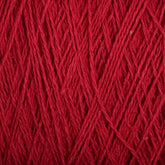 Close-up view of a textured red yarn. The strands are interwoven, showcasing the intricate weaving pattern. This Supreme Corp Homestead 8/2 Cotton Yarn | Large Cone focuses on the rich, solid red color and its fine, slightly fuzzy texture, all while being machine-washable for your convenience.