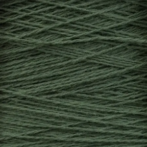 A close-up view of the dark green Homestead 8/2 Cotton Yarn | Large Cone by Supreme Corp, showcasing the intricate texture and crisscrossing pattern of the threads. The yarn appears soft and is tightly wound, emphasizing its uniform thickness and smooth surface.