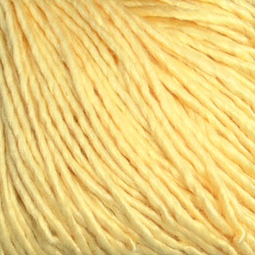 Close-up of Halcyon Yarn's Gemstone Soft Twist Silk Yarn strands arranged neatly, showcasing their visible texture and slight sheen.