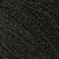 Close-up image of Gemstone Silk Bouclé. The black, curly wool texture showcases densely packed fibers, forming a wavy and intricate pattern that mirrors Halcyon Yarn's finest creations. The surface looks soft and plush, highlighting the natural, coarse details inherent in the wool's structure.