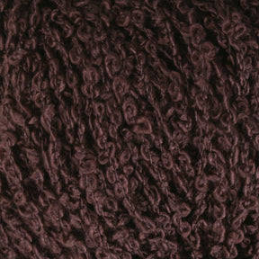 Close-up image of Halcyon Yarn's Gemstone Silk Bouclé, showcasing its dark brown textured fibers in a beautifully knitted loop pattern. The thick and soft appearance of the yarn makes it ideal for knitting or crafting projects.