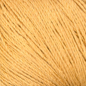 A close-up of a ball of Halcyon Yarn's Gemstone Silk 2/12, displaying the texture and individual strands twisted together. The light brown silk yarn appears soft and slightly shiny, suitable for weaving or knitting projects.